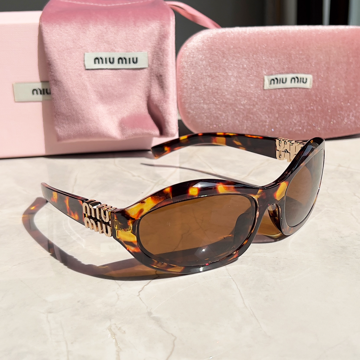 MIU MIU Sonnenbrillen