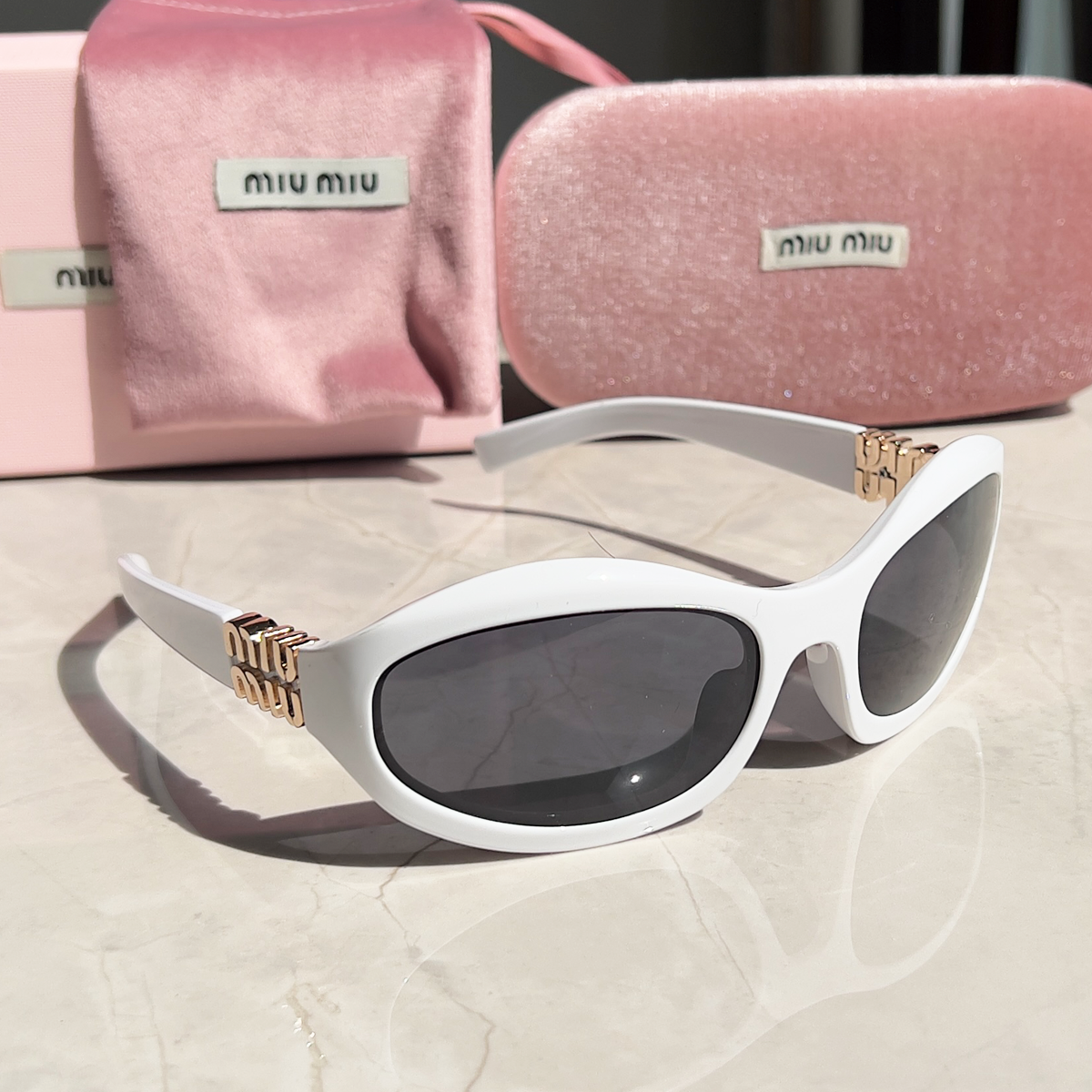 MIU MIU Sonnenbrillen