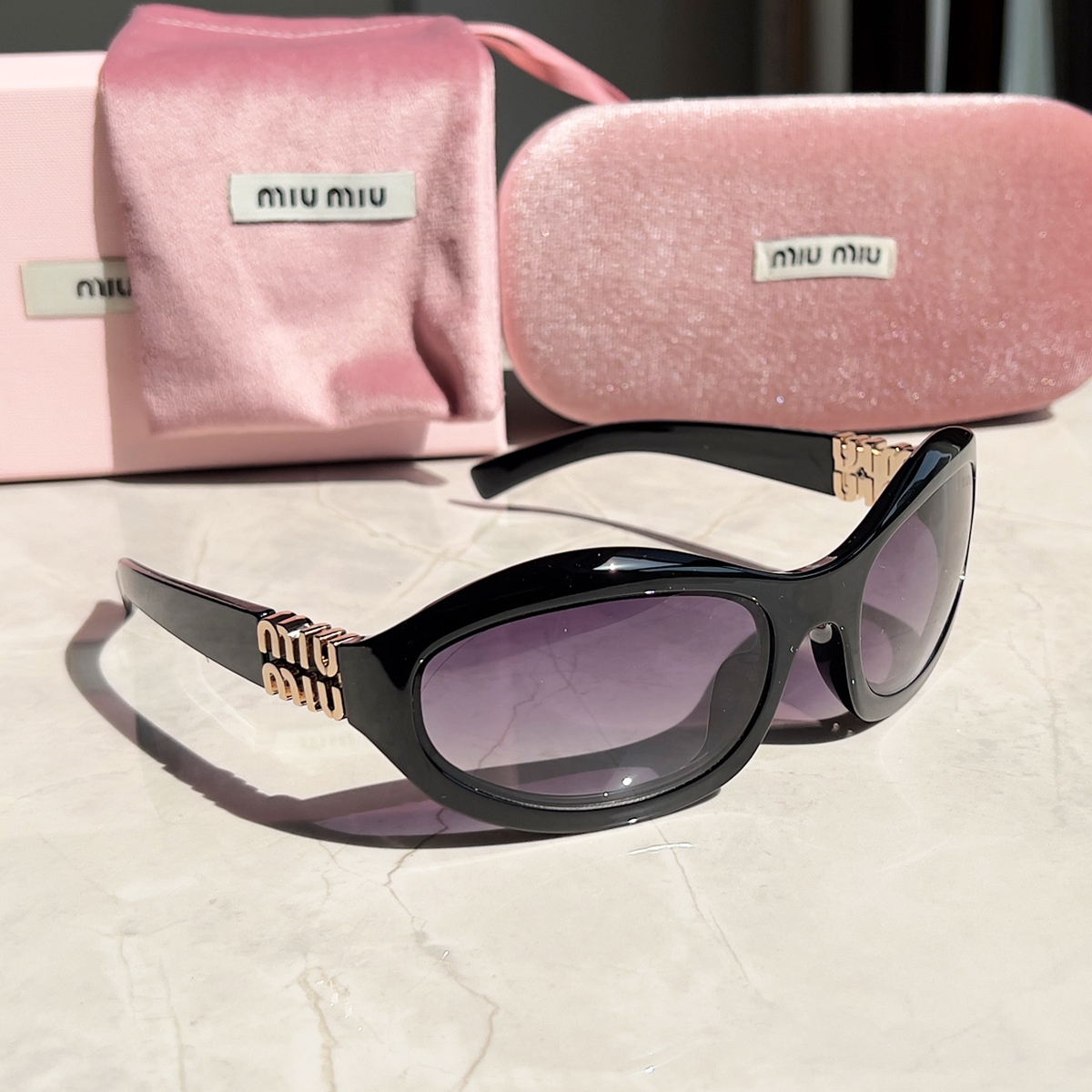 MIU MIU Sonnenbrillen